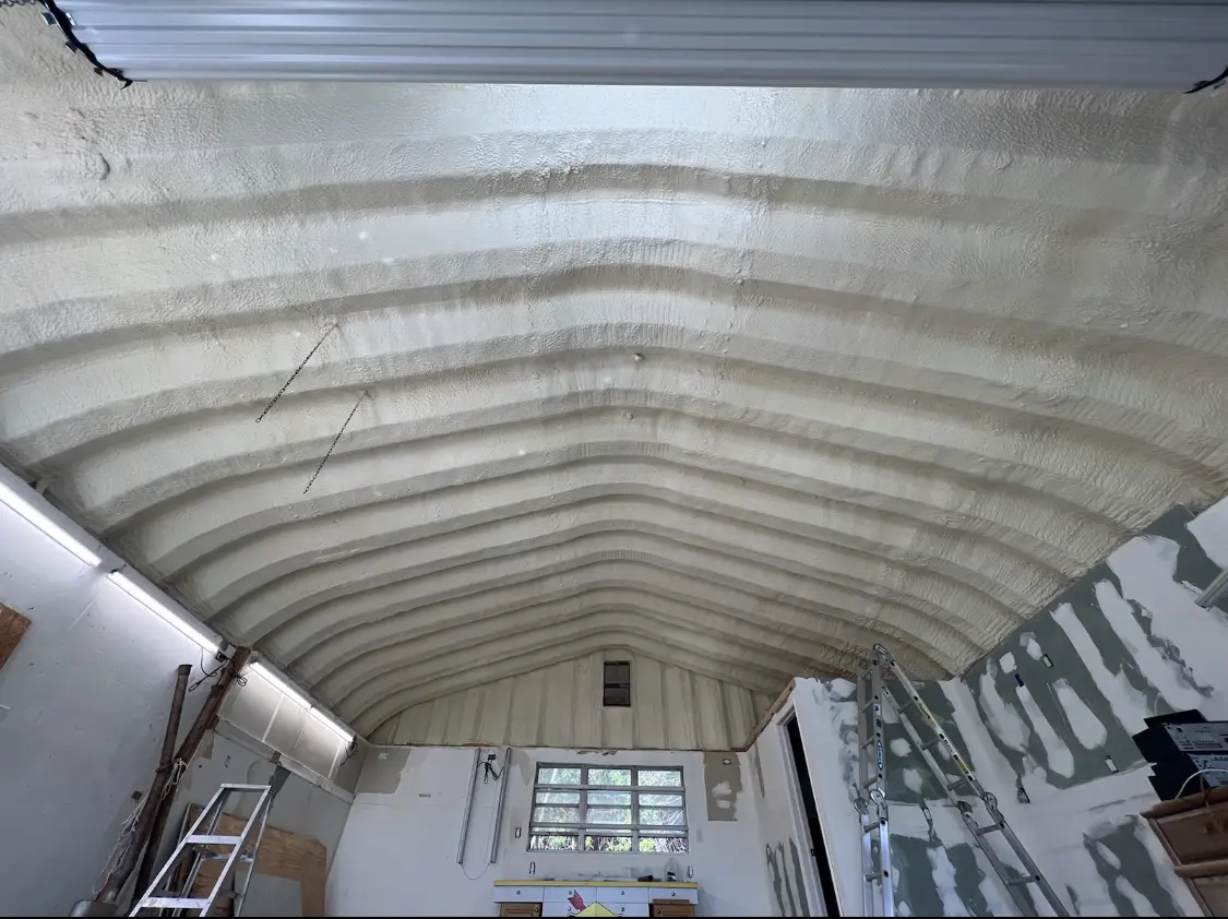 Spray polyurethane foam applied to the underside of a metal roof deck in Highgrove